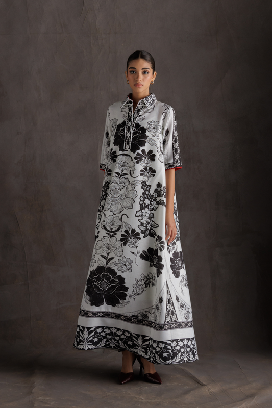 جلابية هندسية زهرية باللونين الأبيض والأسود