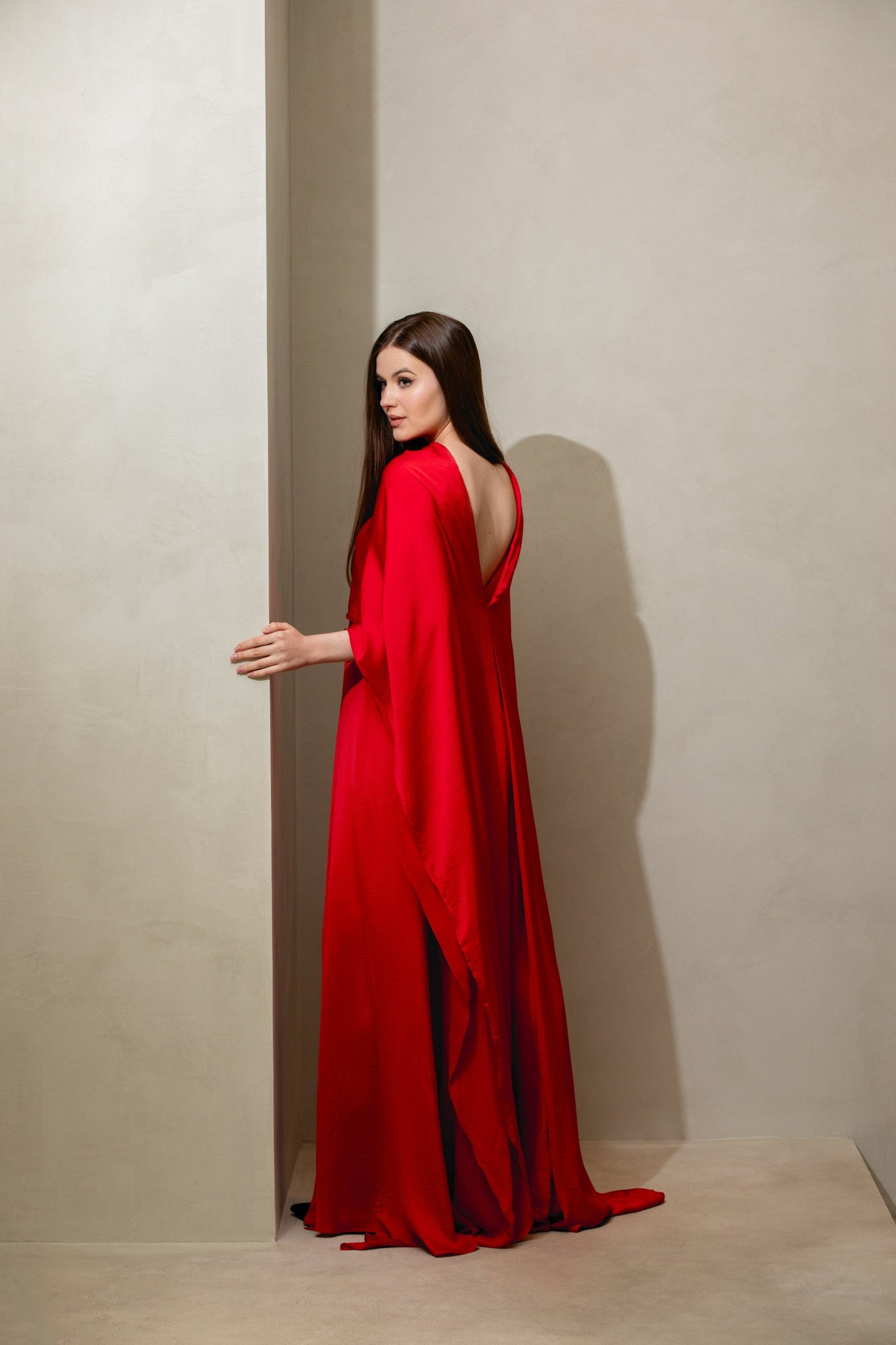 bridal evening cape dress, open back, vibrant red, loose cut