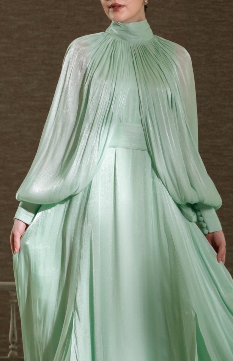 فستان أنيق باللون الأخضر النعناعي - بياقة عالية وأكمام منفوخة