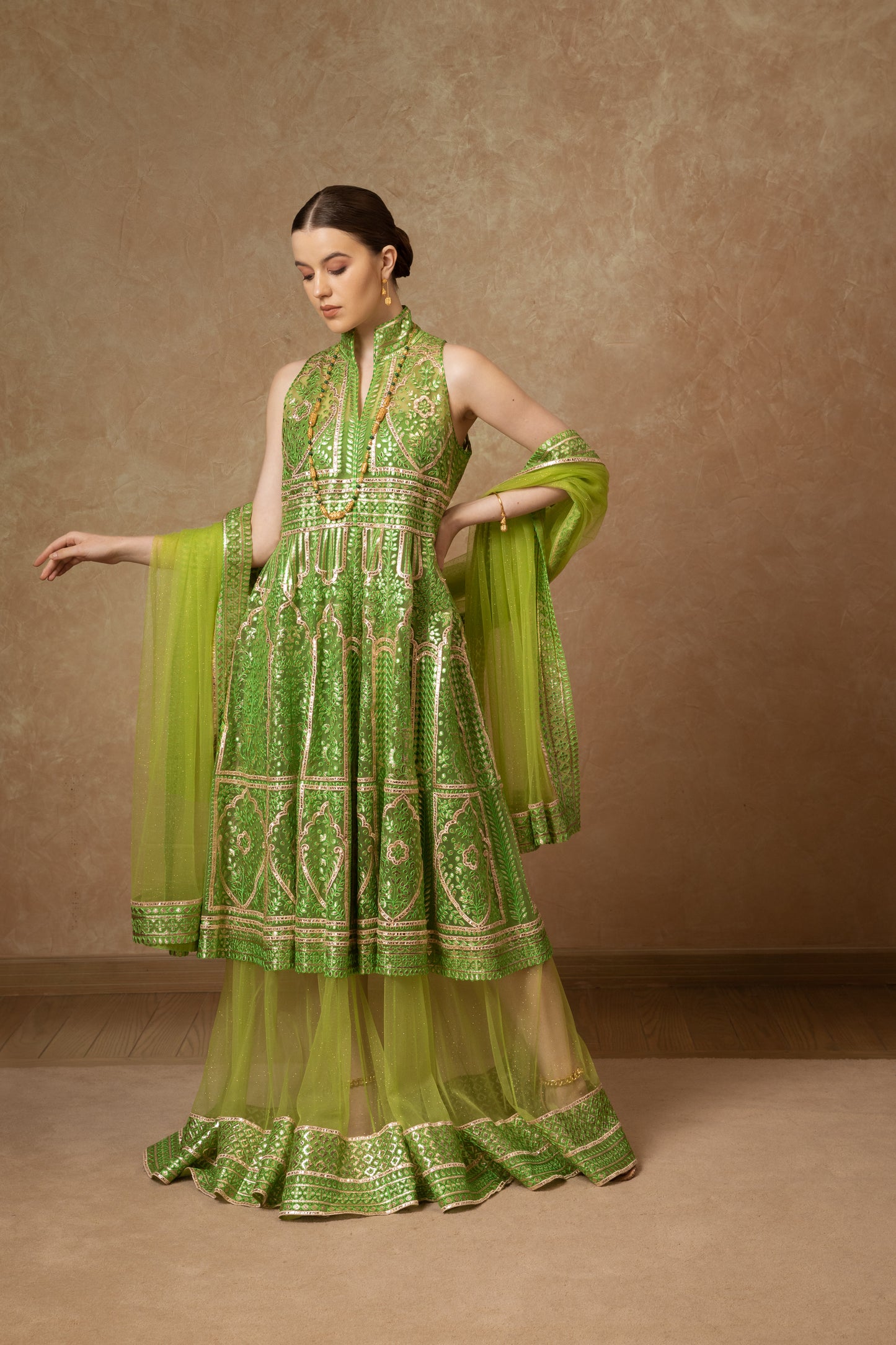 Layered net green gown